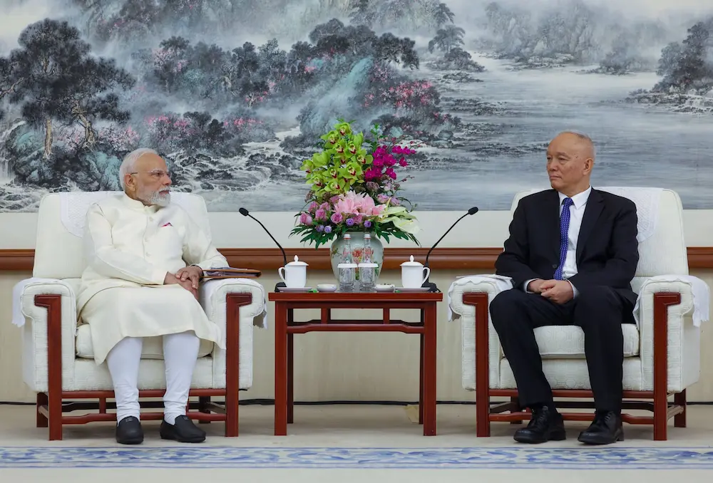 PM Modi meets Cai Qi